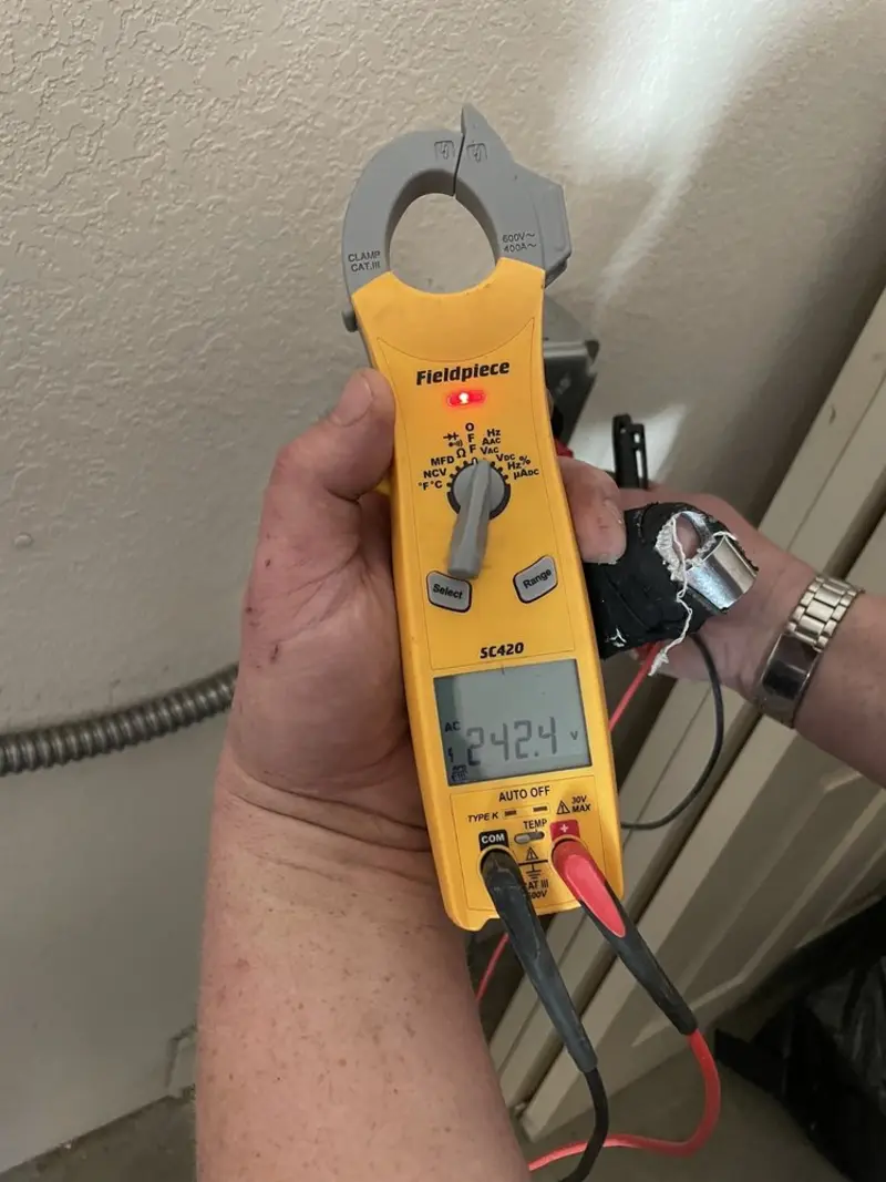 Voltage testing with clamp meter during Electrical Installation Services in Lompoc
